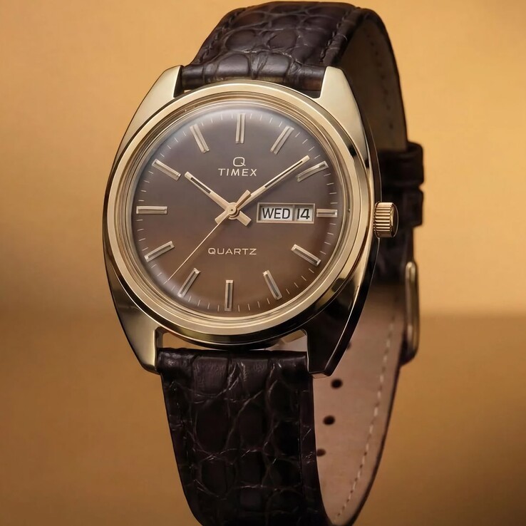 Timex Q 1976 Day and Date újrakiadás füstös barna színátmenetes számlappal, aranyszínű indexekkel és sötétbarna, krokodilmintás bőrszíjjal.