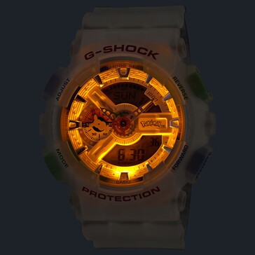 Casio G-Shock Pokémon GA-110 with its amber LED backlight turned on in a dark environment.
