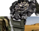 A Casio G-Shock Mudmaster GWG-B1000-1A3 közelképe, amelyen látható a fekete tok, a barna színű számlapdíszítés, az olajzöld szíj, a masszív védőburkolatok és a „Triple Sensor” felirat, katonai felszerelés és sivatagi táj előtt.