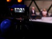 Egy interjút rögzítő fényképezőgépről készült fénykép 