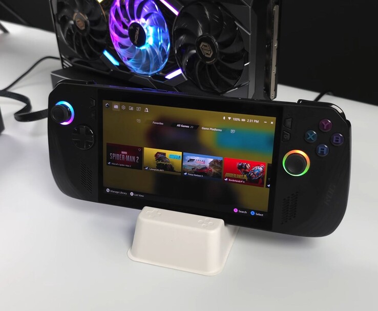 Az Asus ROG Ally X kézi számítógép egy AMD Radeon RX 9070 XT-vel csatlakoztatva egy külső Oculink eGPU dokkolóban, és olyan játékokat mutat a képernyőjén, mint a Spider-Man 2, Cyberpunk 2077, Forza Horizon 5 és Borderlands 4 (Kép forrása: ETA PRIME via YouTube)