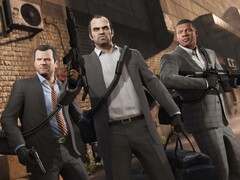 A Grand Theft Auto V főszereplői, Michael, Trevor és Franklin egy rablási küldetésen fegyverekkel és táskákkal. (Kép forrása: Rockstar Games)