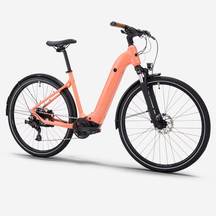 A Decathlon Peach Orange Rockrider E-ACTV 500 e-bike