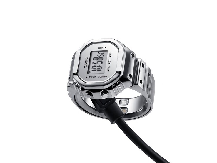 A Casio CRW-H001M-8 okos karóra mágneses USB-töltőkábelhez csatlakoztatva.