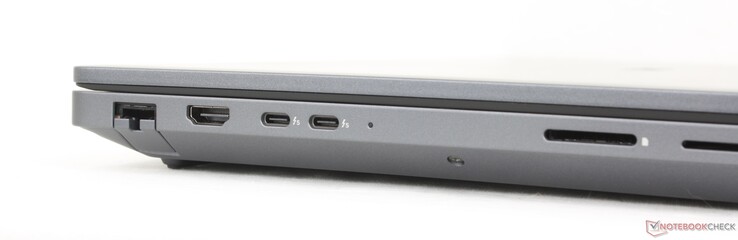 Balra: Balra: RJ-45 (2,5 Gbps), HDMI 2.1, 2x USB-C Thunderbolt 5 (80 Gbps) w/ DisplayPort + Power Delivery, SD kártyaolvasó, Smart Card olvasó (opcionális)