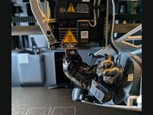 Egy pacalnyi filament a Bambu Lab 3D nyomtató fúvókáján