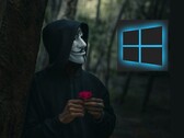 Guy Fawkes-maszkot viselő személy egy Windows-logót néz (Kép forrása: Peakpx és Ahmed Zayan via Unsplash; szerkesztve)