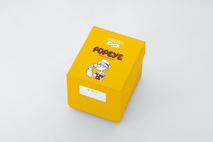 Sárga, különleges kiadású díszdoboz a Seiko 5 Sports x Popeye HDB013 modellhez, Popeye-logóval és jubileumi grafikával.