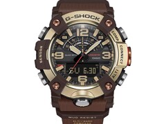 A G-Shock Mudmaster GG-B100XMH-5A közelképe, amelyen jól látható a világos sárgásarany és barna színű tokja és kerete.