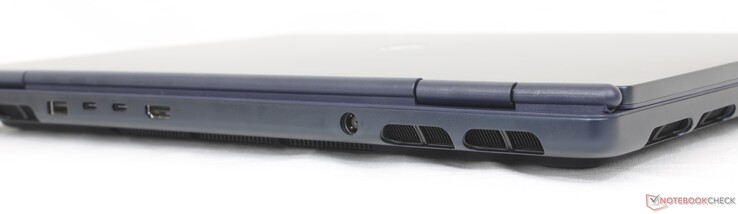 Hátul: (5 Gbps), 1x USB-C Thunderbolt 4 w/ DisplayPort 2.1 (40 Gbps), 1x USB-C 3.2 Gen. 2 w/ DisplayPort + Power Delivery (10 Gbps), HDMI 2.1, hálózati adapter