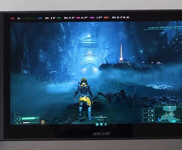 Az AMD Ryzen AI 9 HX 370 kéziszámítógépen futó Returnal, a képernyőn a játékbeli teljesítmény benchmarkja. (Kép forrása: The Phawx)