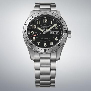 Seiko 5 Sports HDB006 automata terepi karóra fekete számlapon, iránytűs lünettával és rozsdamentes acél szíjjal.