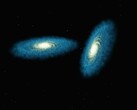 Két galaxist ábrázoló művészi illusztráció.
