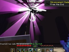 Egy képernyőfelvétel arról, ahogy egy felhasználó legyőzi az Ender Sárkányt a Minecraftban