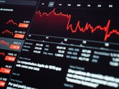 Egy digitális tőzsdei irányítópult, amely pénzügyi adatokat jelenít meg.