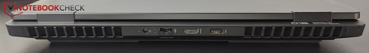 Hátul: USB-A (10 Gbitps): AC, LAN, HDMI 2.1, USB-A (10 Gbitps)