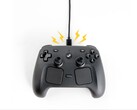 Művészi renderelés a Steam Controller töltéséről a mágneses koronggal.