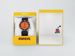 Seiko 5 Sports x Popeye HDB013 automata karóra narancssárga számlappal, korlátozott példányszámú sárga díszdoboz mellett.