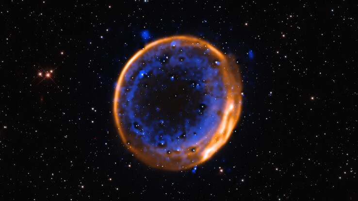 Az SNR 0509-67.5 kettős detonációjú szupernóva képe a VLT által látottak szerint. (A kép forrása: ESO/P. Das et al. Háttércsillagok (Hubble): K. Noll et al.)